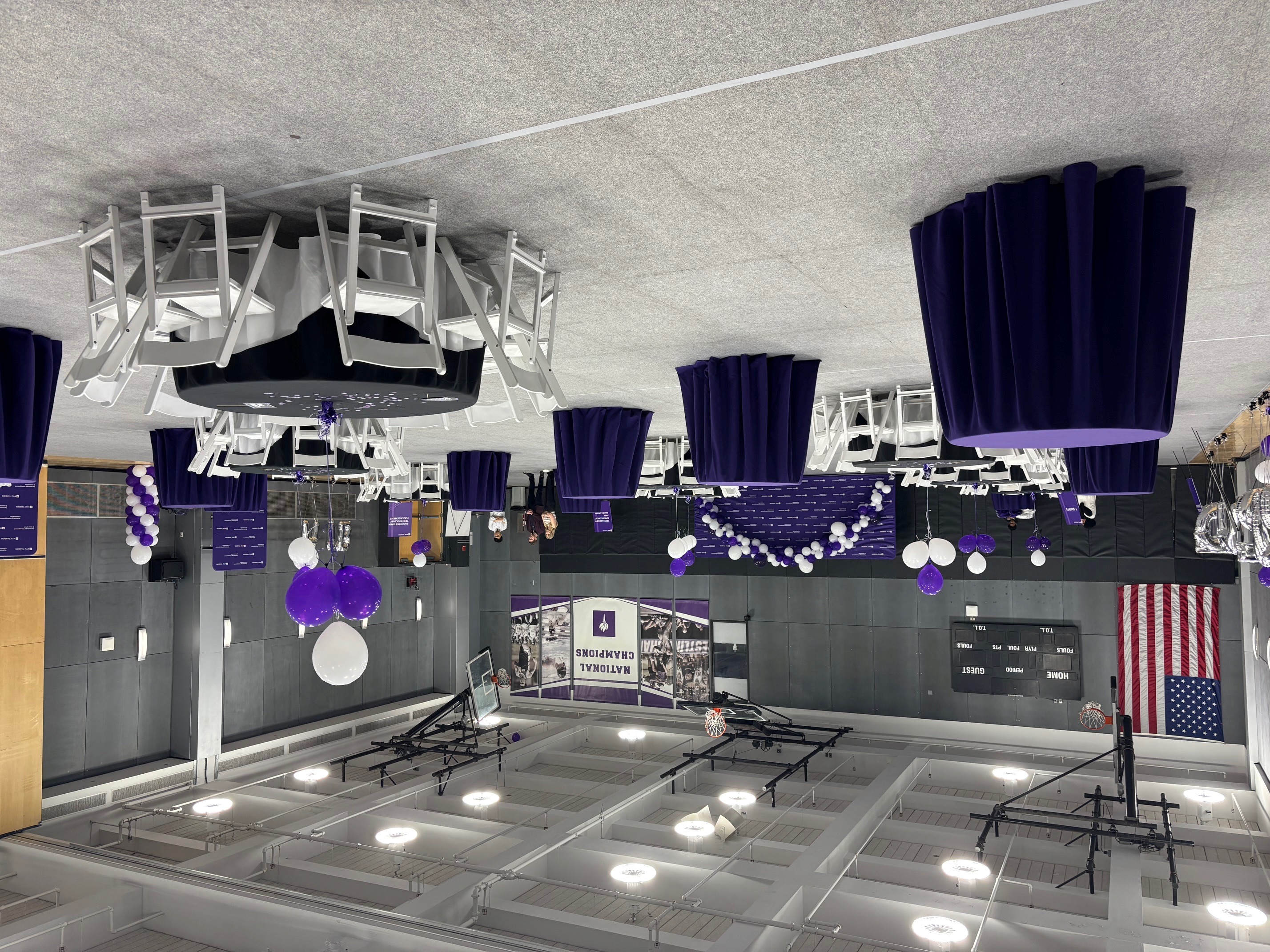 Large open space with table, chairs, and decor